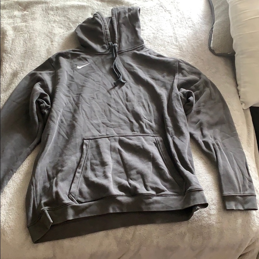 A faded grey color Nike sweatshirt